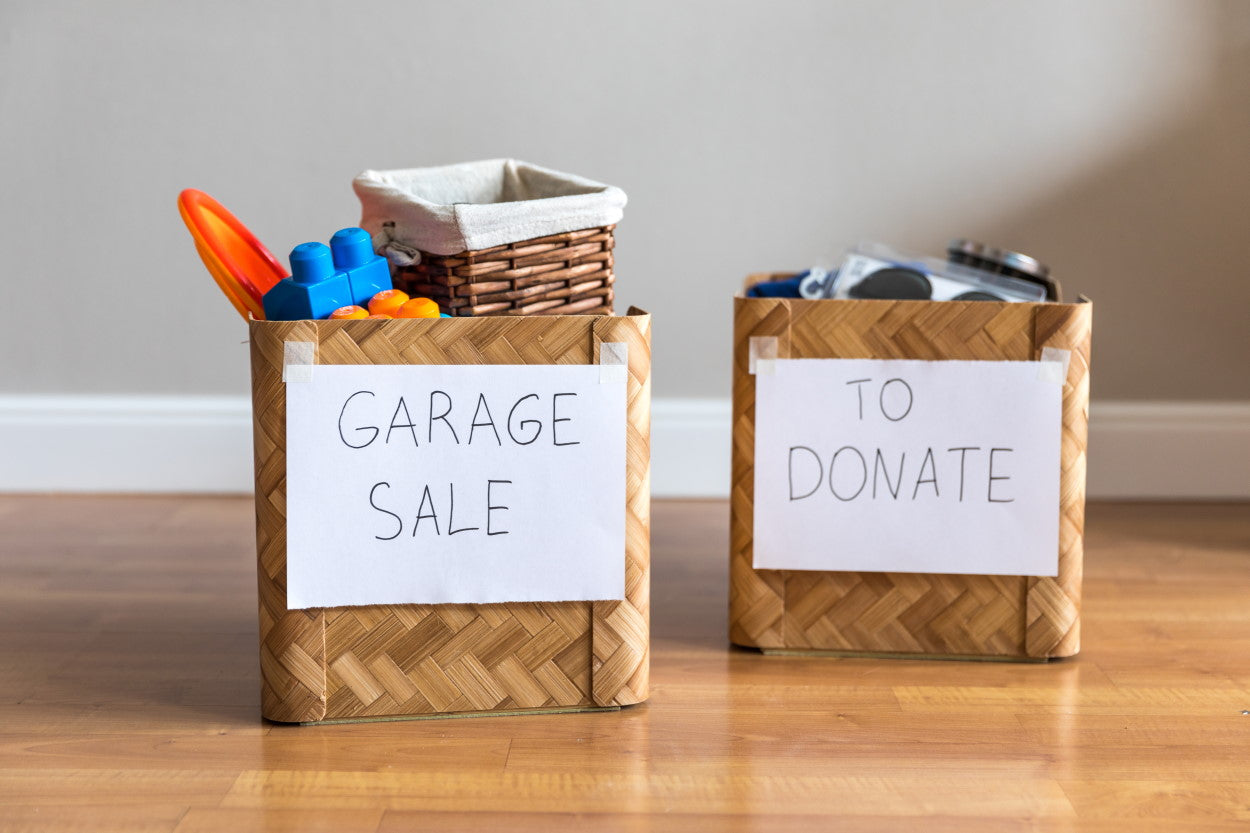 Filled bins labeled "Garage sale" and "To donate"