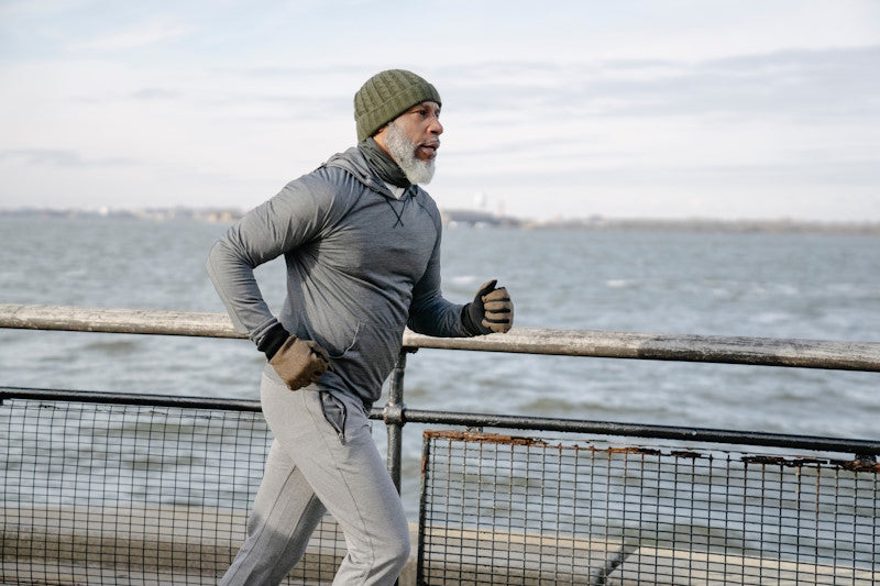 Man running on embankment